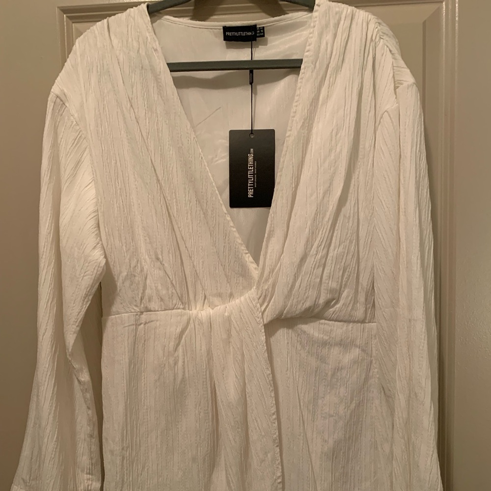 Deep V, lined pleated dress